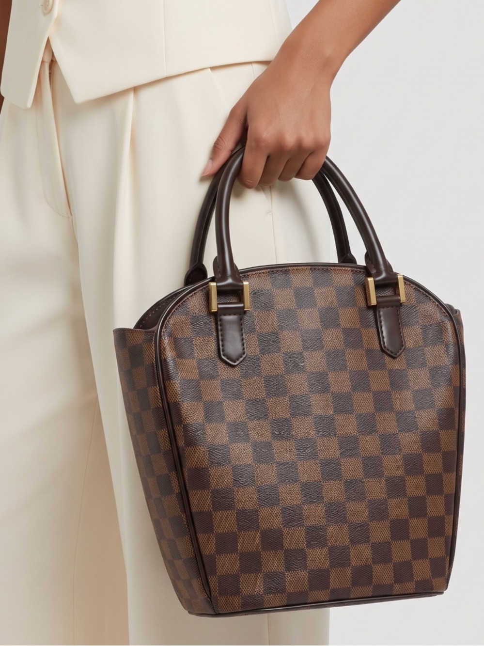 Louis Vuitton GM Sarria Seau Damien Ebene Canvas Handbag.